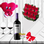 CAJA DE 12 ROSAS, VINO, PELUCHE Y COPAS