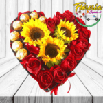 ENCANTADOR DETALLE ( CAJA CORAZON CON 12 ROSAS 3 GIRASOLES Y 7 BOMBONES )