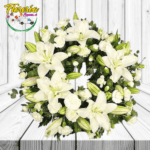 CORONA FUNEBRE DE LILIUM Y FOLLAJE