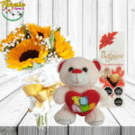 RAMO DE 5 GIRASOLES EN PAPEL TRANSPARENTE, BOMBONES BELGIAN Y PELUCHE DE 20CM