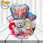 ARREGLO DE PELUCHE, NUTELLA, FERREROS Y GLOBOS