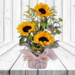 ARREGLO DE 3 GIRASOLES Y FOLLAJE