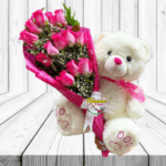 RAMO EXTENDIDO DE 12 ROSAS Y PELUCHE DE 40 CM
