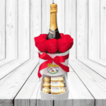 BOX DE 8 ROSAS, CHAMPAGNE DE 375 Y BOMBONES