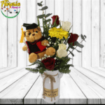 FLORERO 5 ROSAS, 1 GERBERA, FOLLAJE Y PELUCHE 20CM