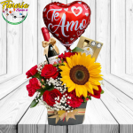 CAJA DE FLORES 7 ROSAS 1 GIRASOL 1 VINO 375ML FERREROS DE 100G Y GLOBO