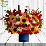 IMPRESIONANTE BOX 24 ROSAS 5 GIRASOLES Y FLORES DE TEMPORADA VINO 750ML
