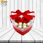 CAJA CORAZON CON VENTANA ACRILICA DE 2 ROSAS PRESERVADAS Y 6 BOMBONES FERREROS ROCHER